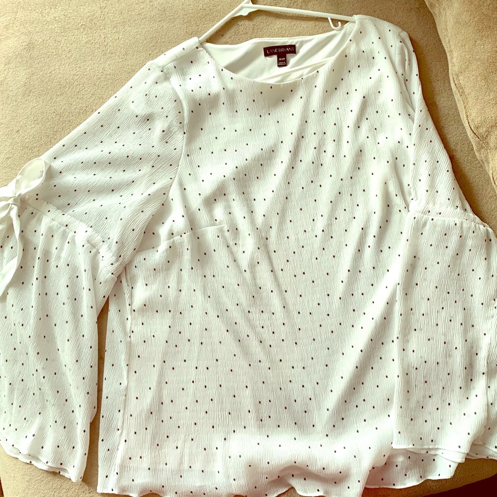 White polka dot bell sleeve blouse